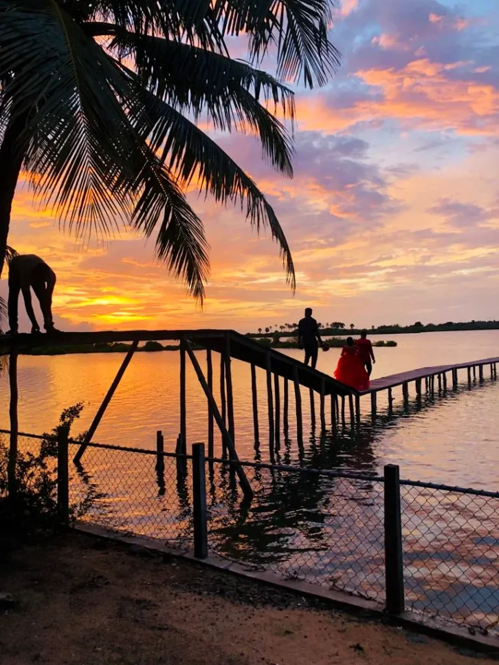 Sunset view of the lagoon jetty at Valampuri Resort, Kalpitiya