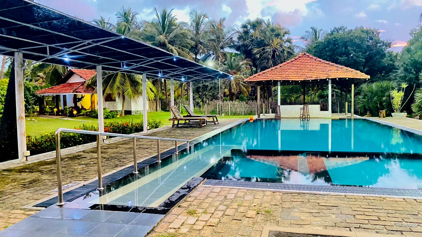 Valampuri Resort pool and garden in the evening