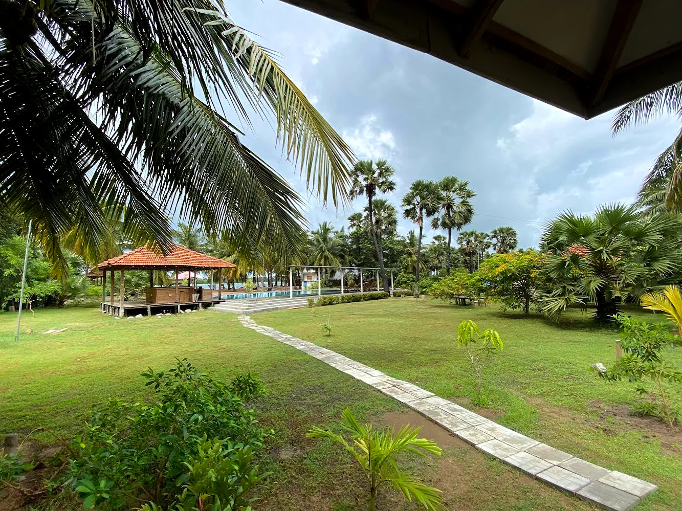 Valampuri Resort garden and pool area