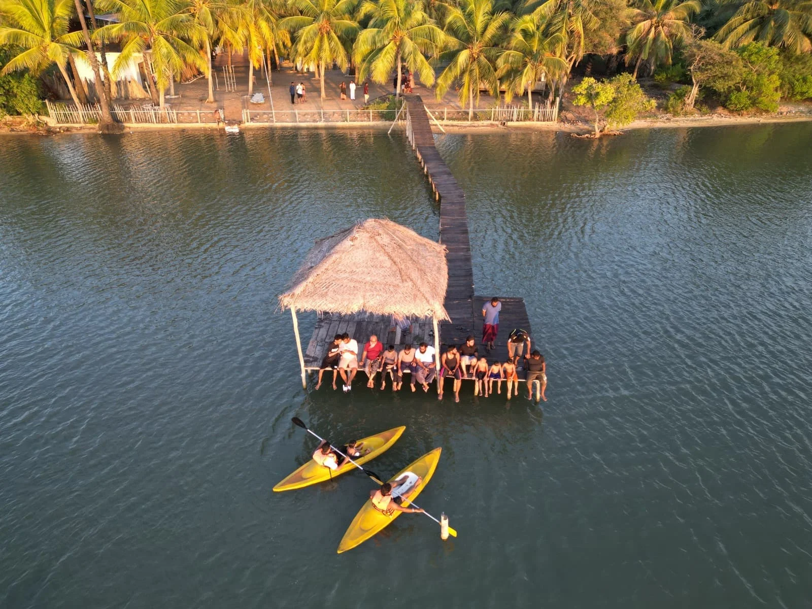 Sunset deck view of the lagoon jetty at Valampuri Resort