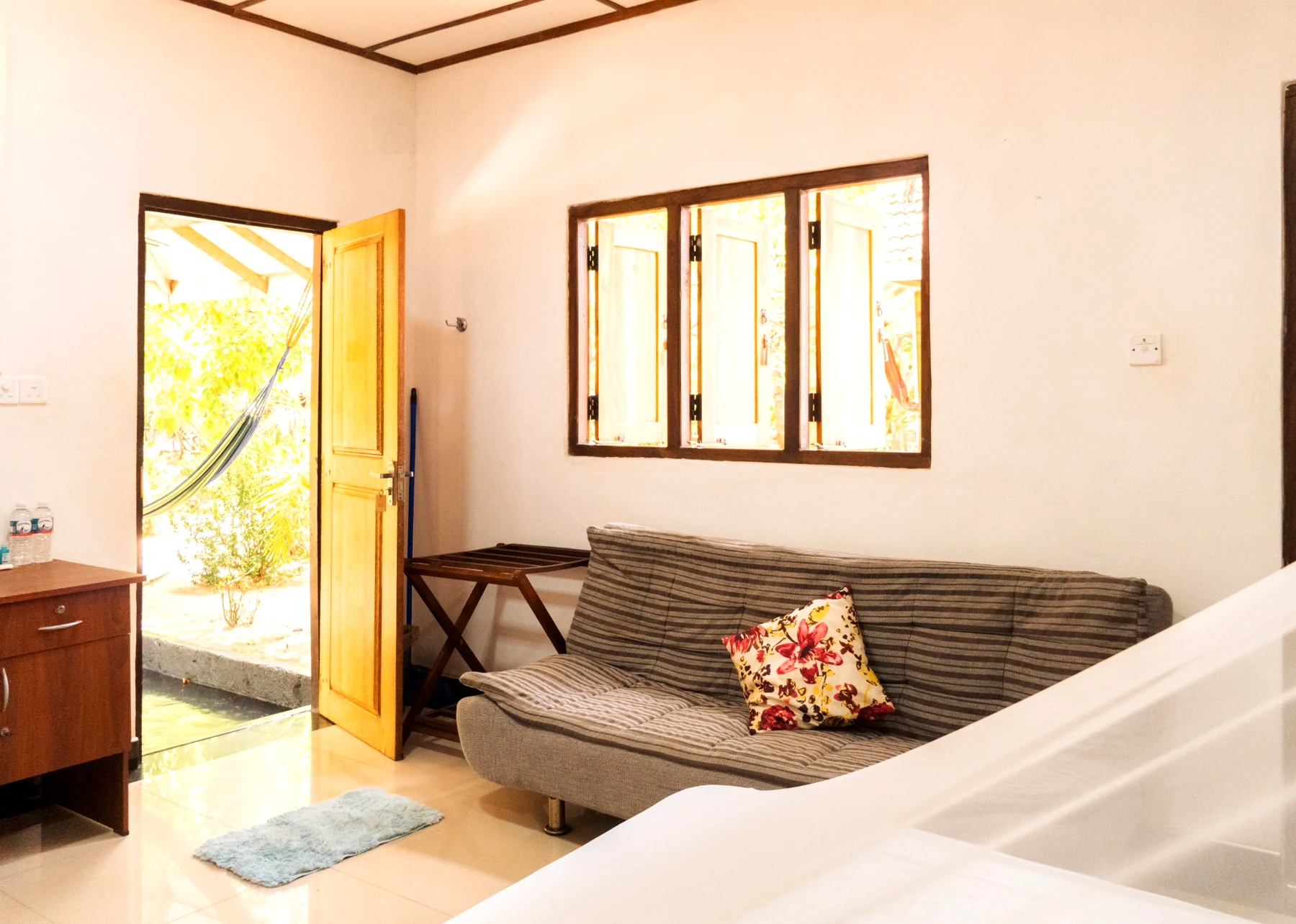 Lounge corner inside the Poolside Comfort Chalet